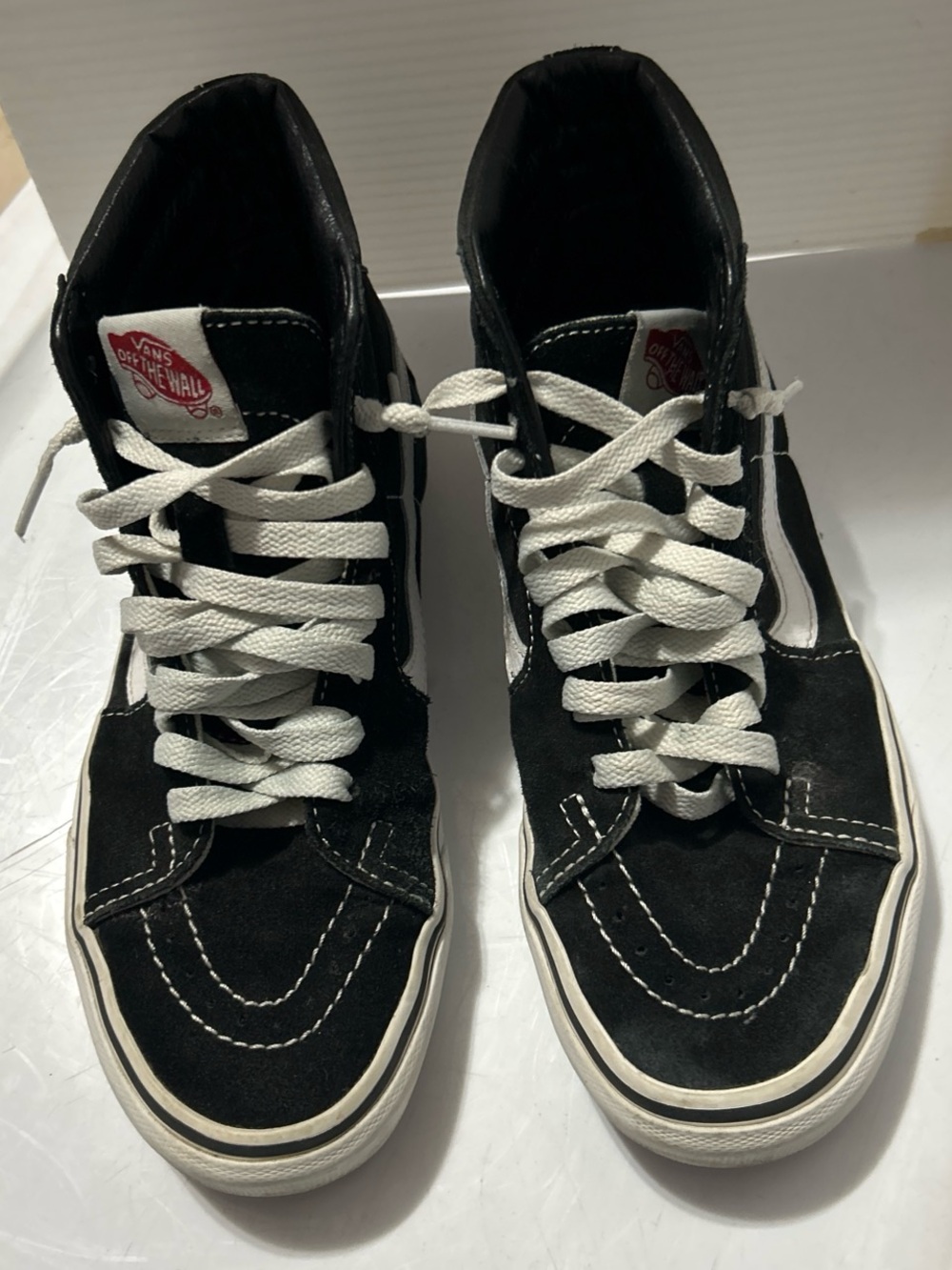 Vans Black and White High-Top Skate Sneakers